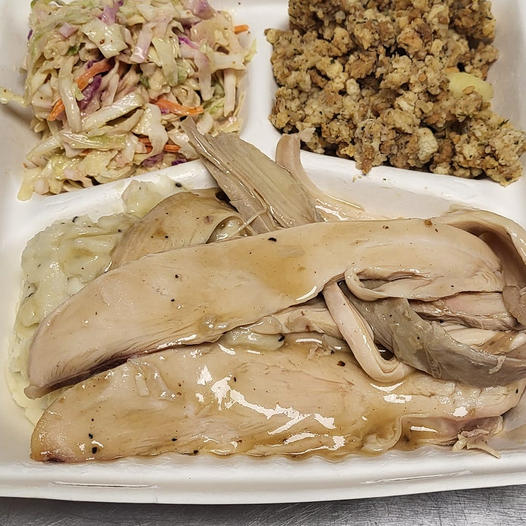 sliced turkey and gravy available at Oliver's butcher and catering